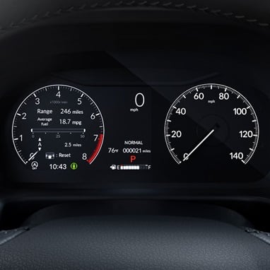 Honda Odyssey digital instrument cluster showing speedometer and tachometer (Minivan).