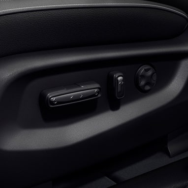 Honda Odyssey modern van close up detail of the power seat adjustment controls on the driver seat (Minivan).